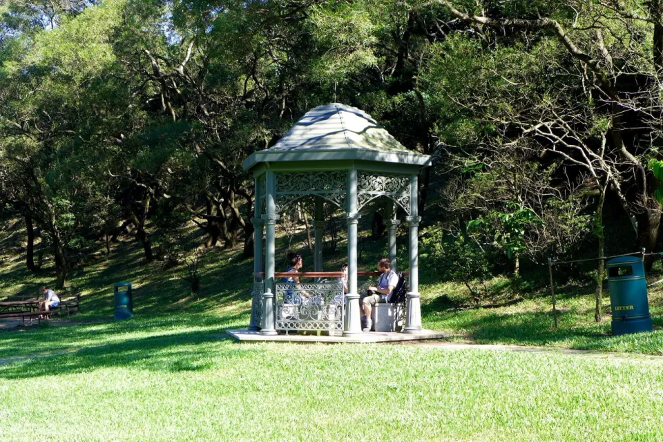 Pavilion standing in the lawn at Victoria Peak Garden