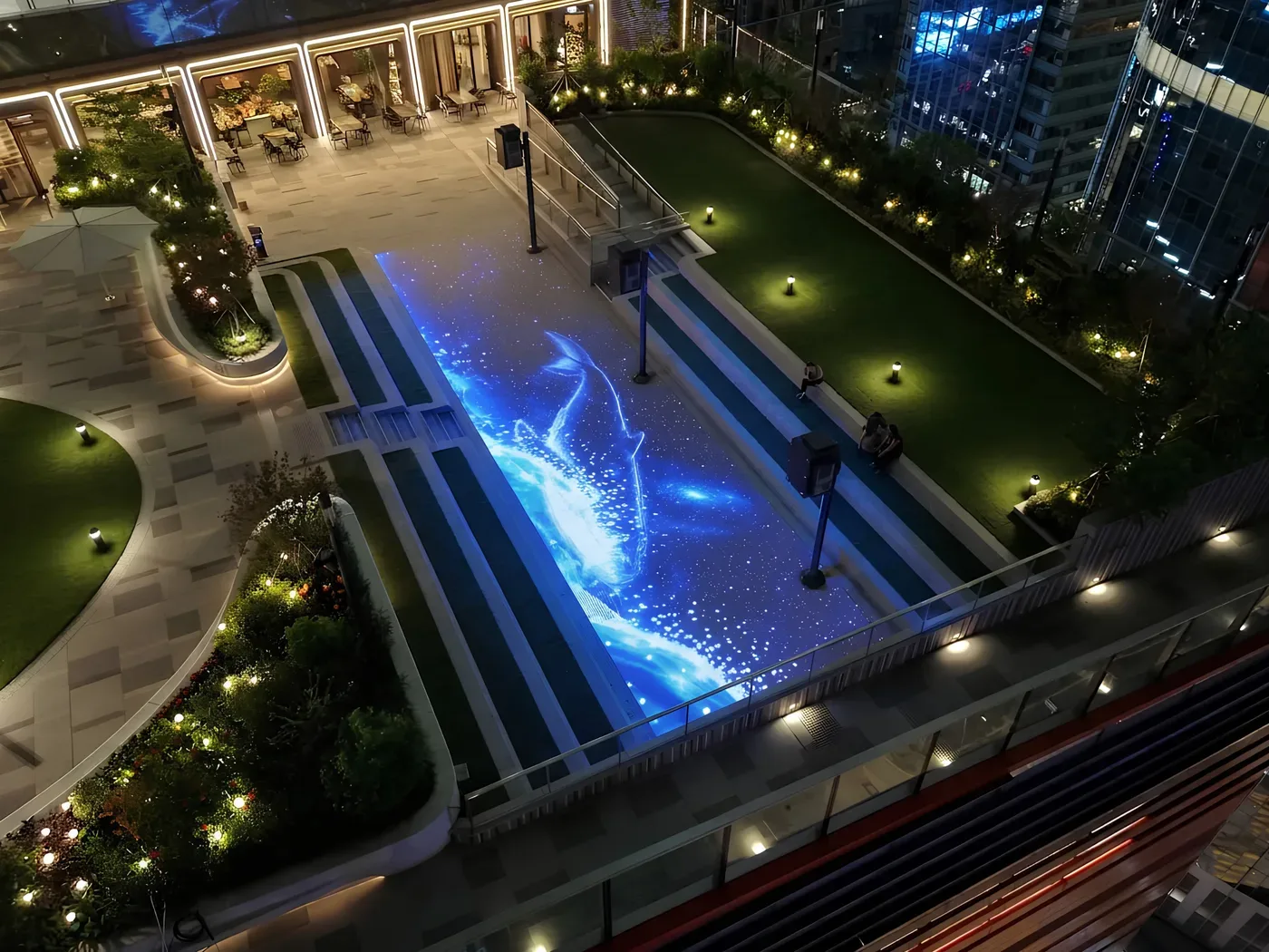 Blue whale projection at Mega Sky's nighttime Light-and-Shadow Aquarium